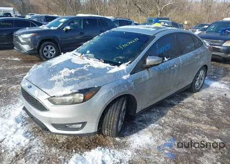 2015 Ford Focus Se z USA, uszkodzony, nr VIN 1FADP3F21FL302515